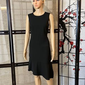 White House Black Market  midi dress in black.   NWT Size 4.
